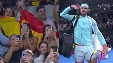 Watch: Rafael Nadal walks out to play first match in 349 days and fans go wild in Brisbane