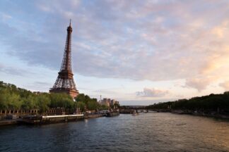 Central Paris enters lockdown, Olympic athletes arrive to the games village