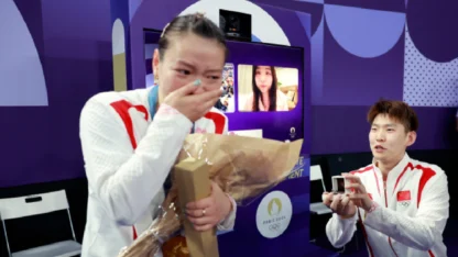 Chinese badminton player gets wedding proposal after winning gold at Paris Olympics