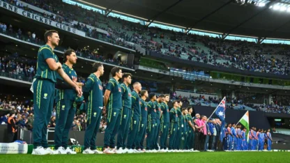 Why are players wearing black armbands in India vs Australia 2nd T20I in Melbourne?