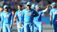 India captain MS Dhoni leads his team from the field after they dismissed Zimbabwe for 287 runs in the 2015 ODI World Cup in Auckland.